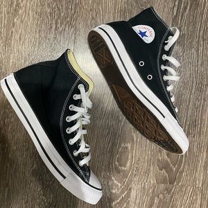 Women’s converse high top sneaker.